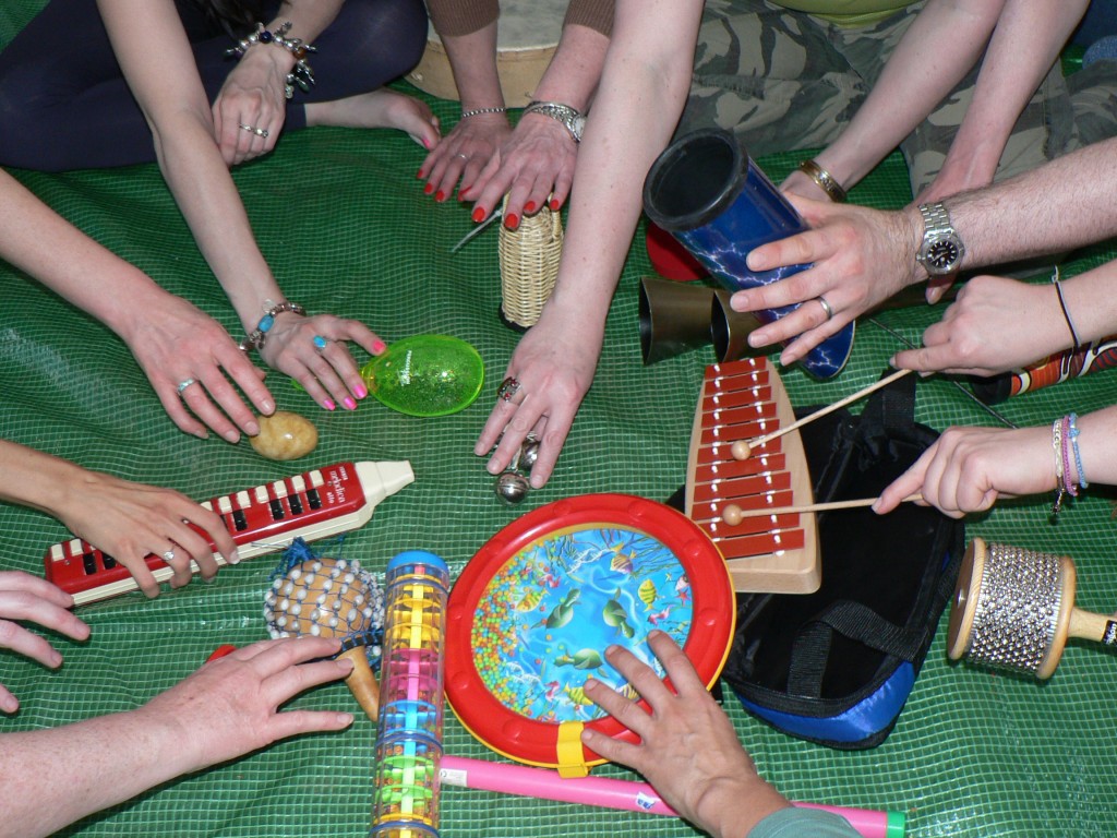 Hands touching musical instruments