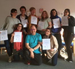 Jon Blend and training group holding certificates