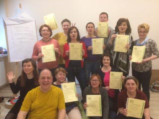 Jon Blend and training group holding certificates