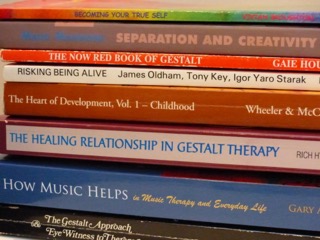 Pile of books about therapy