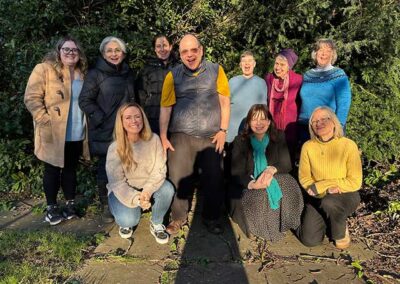 John with group of training attendees.